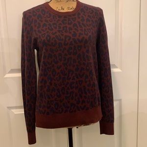 Nice warm sweater for fall/winter. Matching sleeve, neck, and bottom trim.